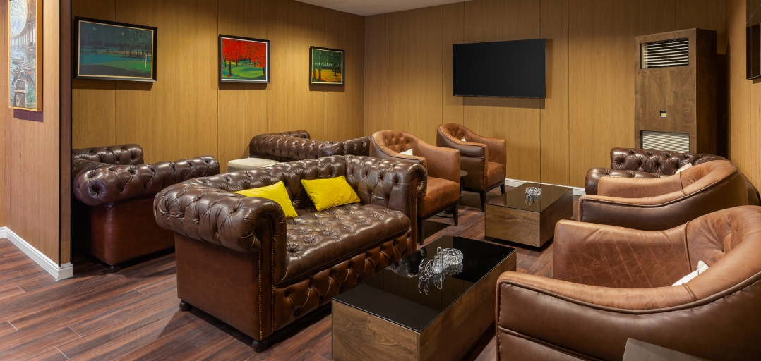 Leather lounge chairs and warm wood finishes